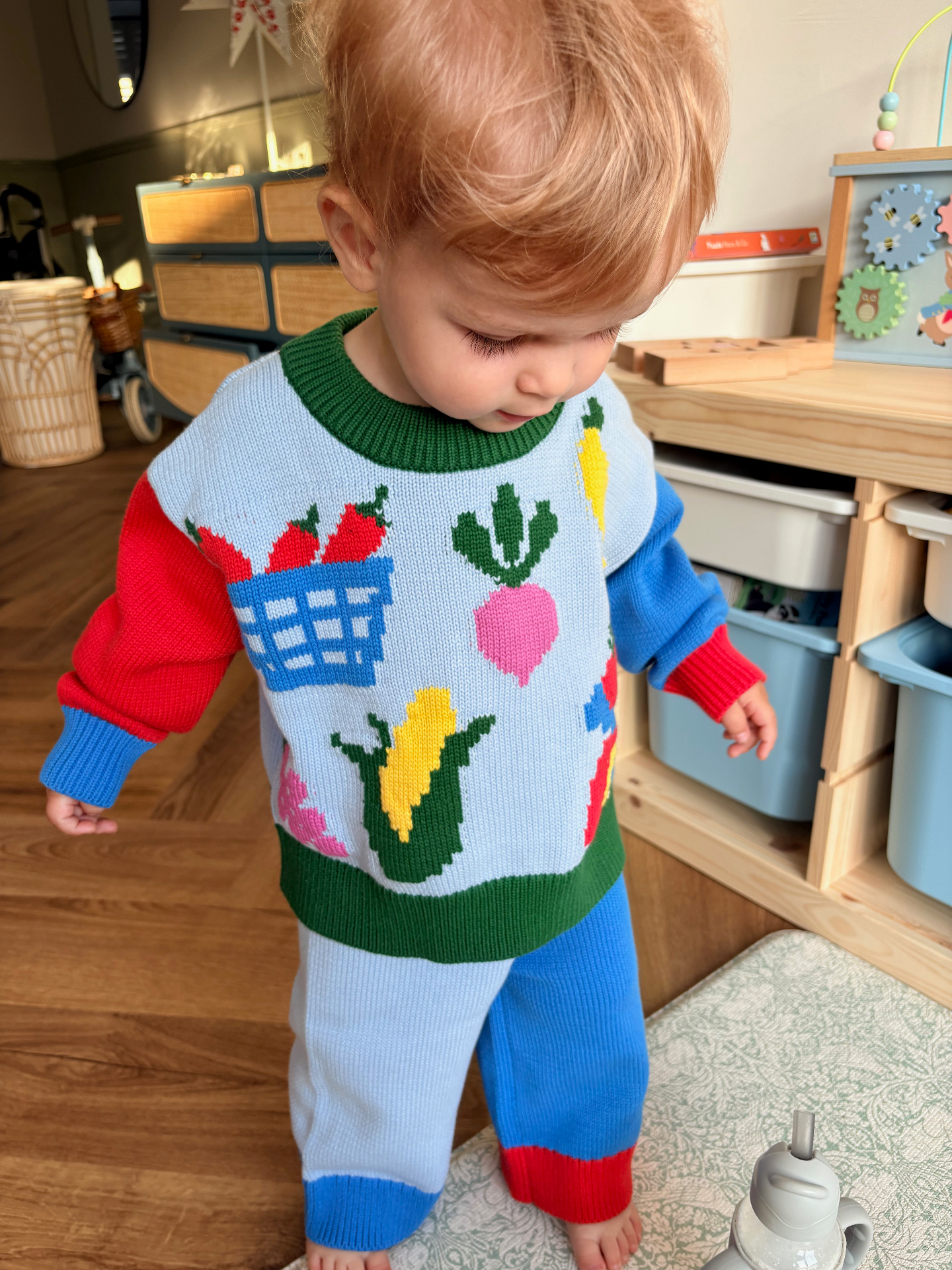 Little one wearing the Market Day jumper and trousers at home